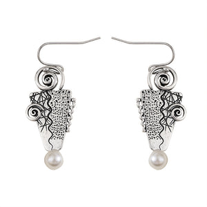 Inverted triangle with pearl earrings
