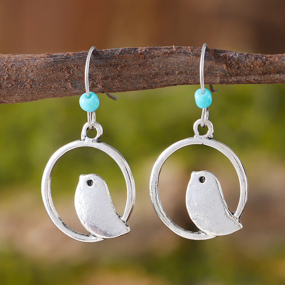Sapphire Round Openwork Bird Earrings