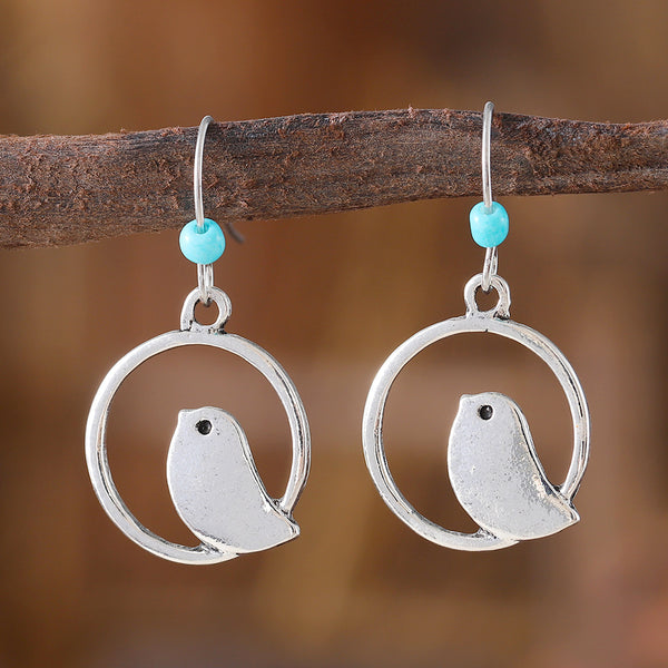 Sapphire Round Openwork Bird Earrings