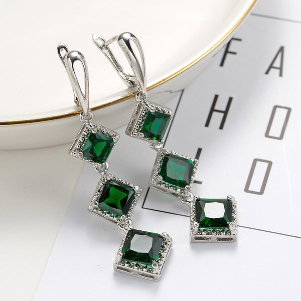 Green exaggerated long earrings