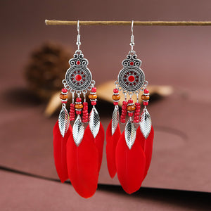 Round oil droplet craft feather earrings