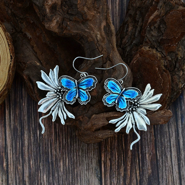 Blue Antique Silver Dangling Butterfly Earrings