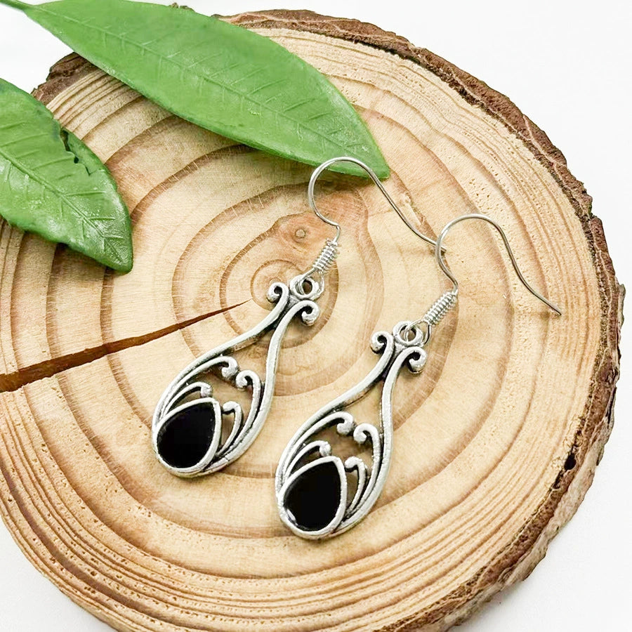 Fashionable Teardrop Skeleton Dangle EarringsMaterial