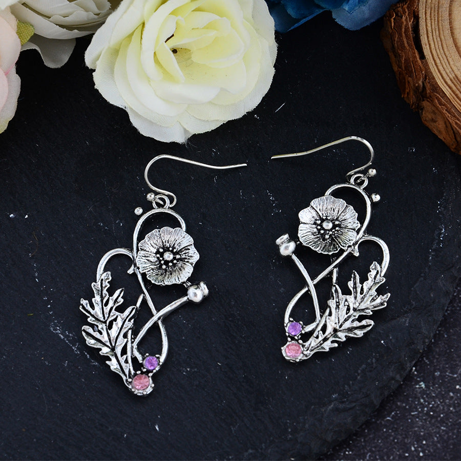 Skeleton and Diamonds Floral Earrings
