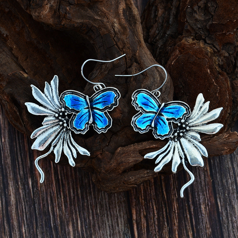 Blue Antique Silver Dangling Butterfly Earrings