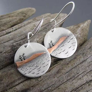 Circular Carved Metal Earrings