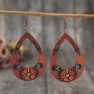 Droplet shaped hollow engraved earrings